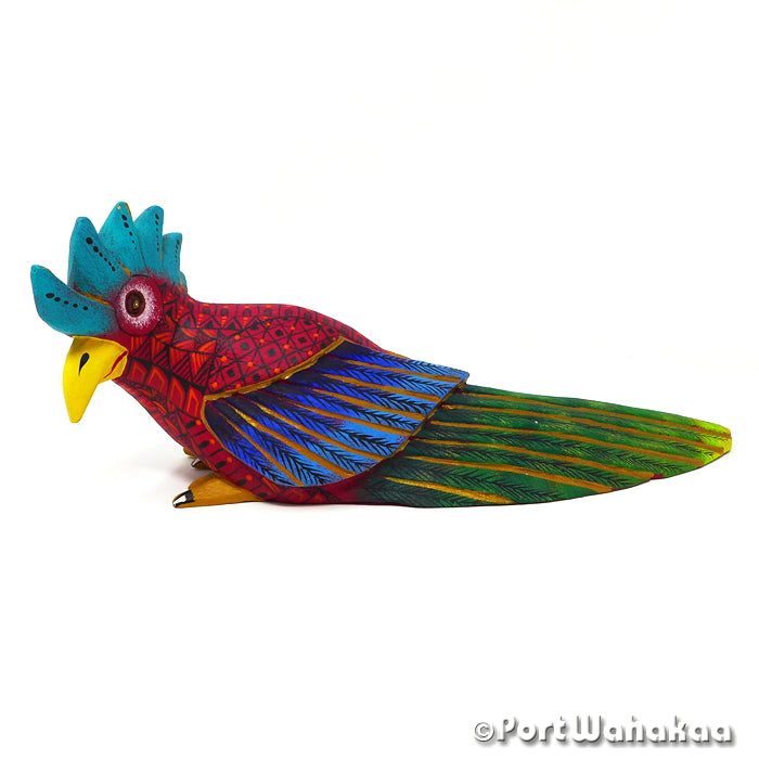 Trofeo Bird alebrije sculpture featuring vibrant colors and intricate feather patterns, handcrafted by Gil Santiago.
